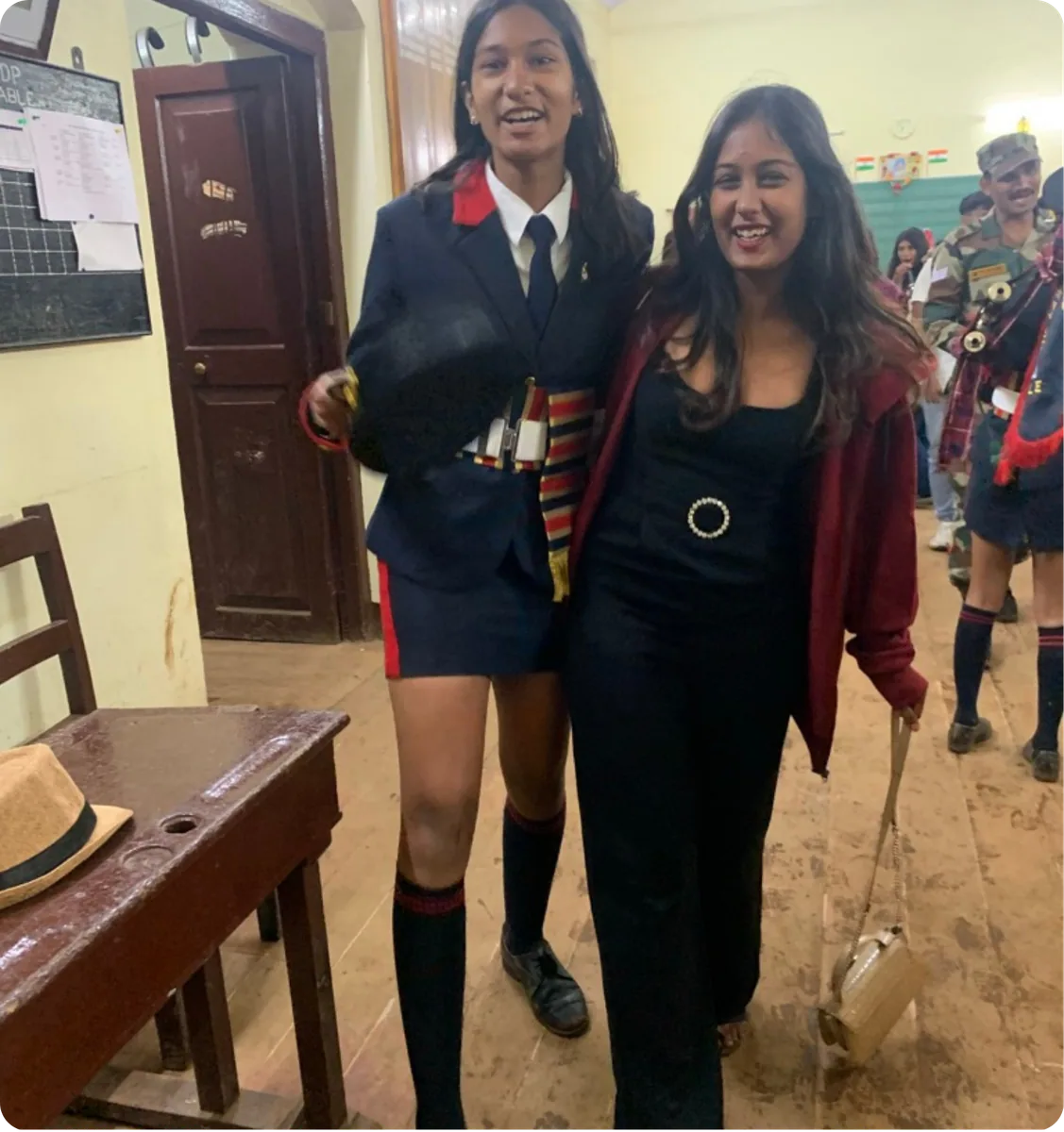 The sisters together in school uniform, on the last day before they went their separate ways.